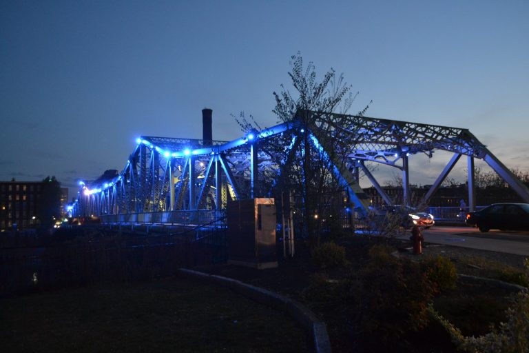 John E. Cox Memorial Bridge in Lowell has blue lights on